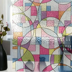 film décoratif fenêtre géométrique multicolore moderne adhésif intimité thermique UV