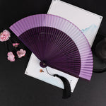éventail pliant traditionnel vert foncé noir marron clair décoration mariage accessoire fête parfumé chinois
