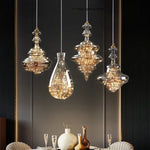 suspension lumineuse moderne transparente dorées câble suspendu élégante led trois couleurs chambre principale