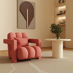 fauteuil moderne tissu texturé beige jaune marron clair coussin décoratif salon minimaliste