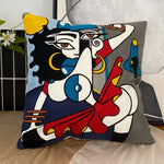 housse coussin coton brodé motifs abstraits visages stylisés moderne pop art bleu blanc orange