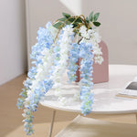 guirlande artificielle fleurs rouge orange bleu rose moderne extérieur accrochée decoration maison jardin mariage