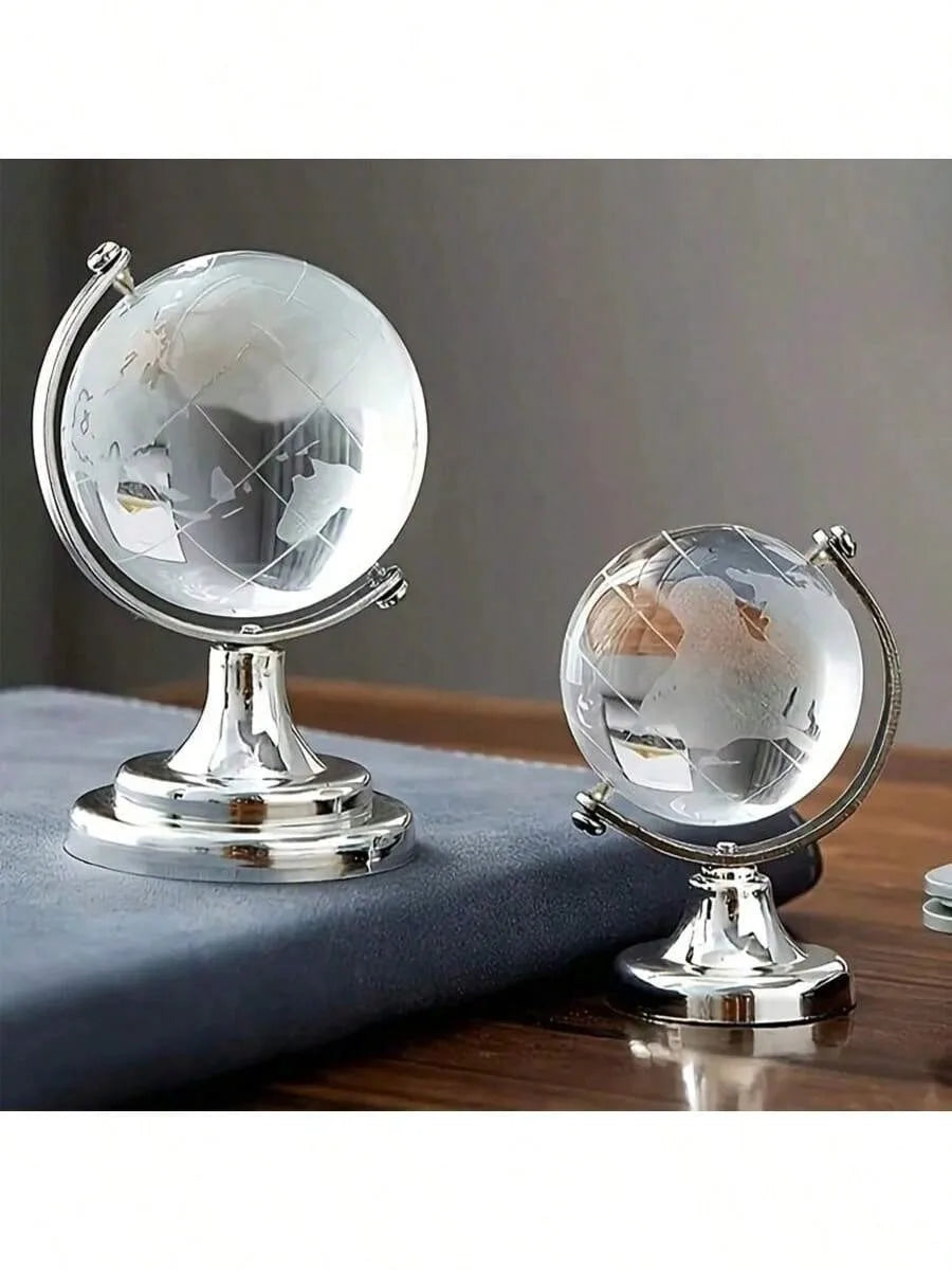 globe terrestre transparent cartographie monde gravée support métallique décoration classique ornement argenté