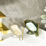 porte savon feuille transparente bord doré motif rayonné savon blanc vert orange moderne élégant