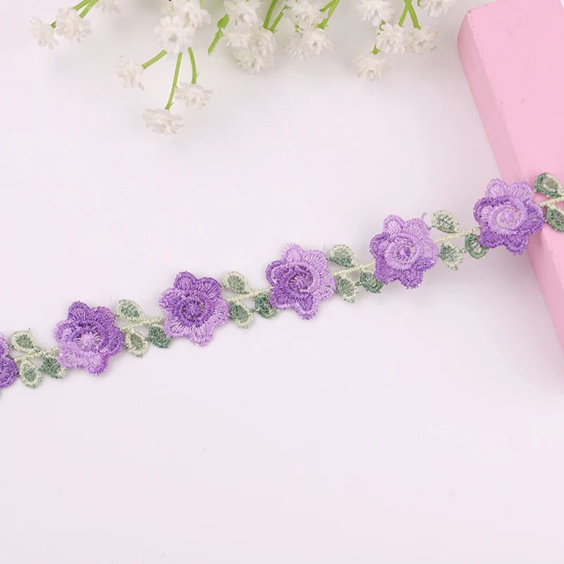 ruban décoratif brodé fleurs rose violet jaune vert polyester largeur cm fleurs brodées opaquet