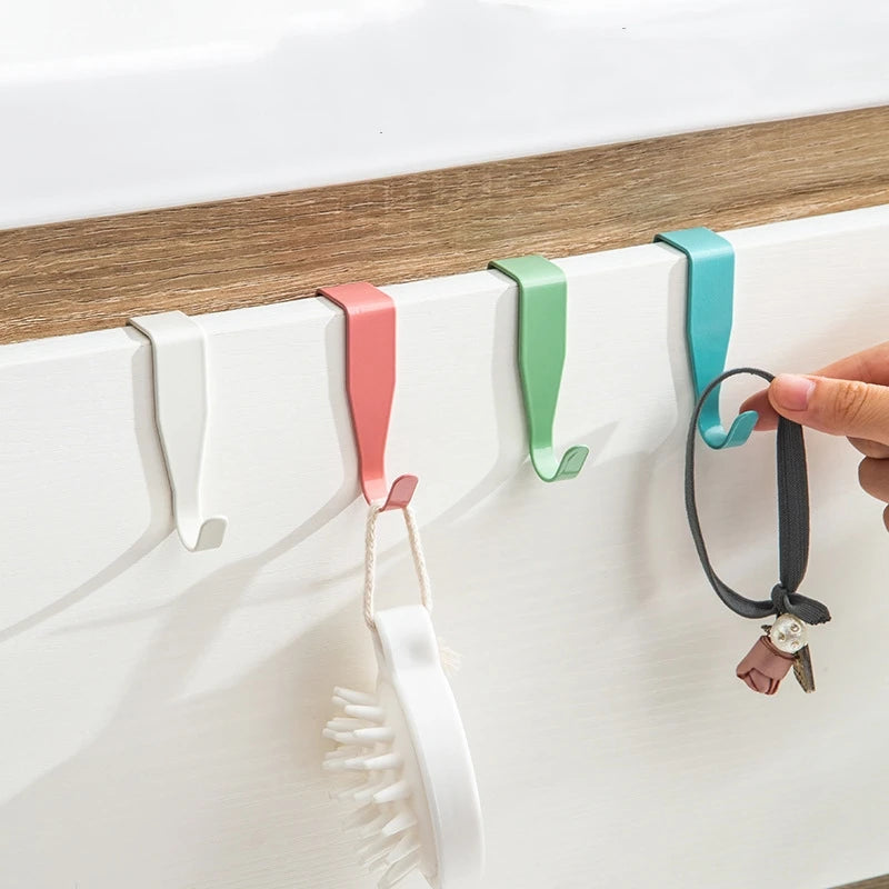 porte serviettes adhésifs modernes minimalistes vert rose bleu blanc organisateur rangement serviette ciseaux bloc