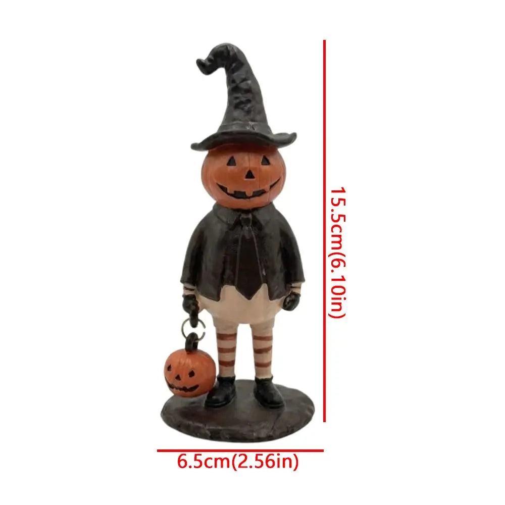 figurine halloween citrouille orange visage chapeau robe bas suspendue noire