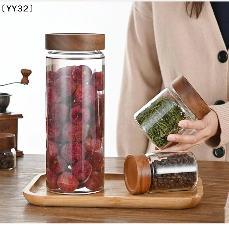 bocaux verre transparent bouchons bois nourriture conservation fruits secs organisation domestique moderne minimaliste