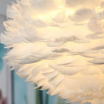 lampe suspendue moderne plumes blanc salon chambre coucher lumière intérieure décoration maison