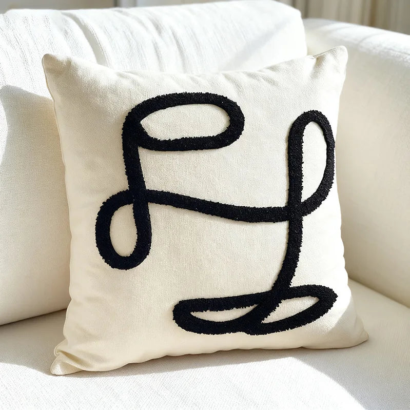 housse coussin décorative polyester coton blanc noir motif carreaux contemporain respectueux environnement maison hospitalière