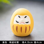 statue daruma gris relief sculpté artisanal traditionnel maison décoration bouddhiste