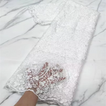 dentelle blanche brodée fleurs motifs floraux tissu coton mariage opaque simple