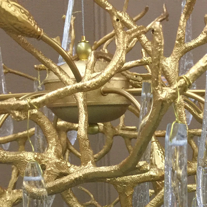 lustre cristal doré branches feuilles translucides moderne élégant suspension salon chambre luxe décoratif