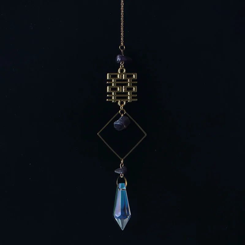 bijou pendentif cristal or bleu violet vert formes géométriques motifs oculaires translucides boho chic