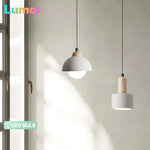 lampe suspendue moderne minimaliste gris clair blanc ampoule led texture béton fixations câble noir