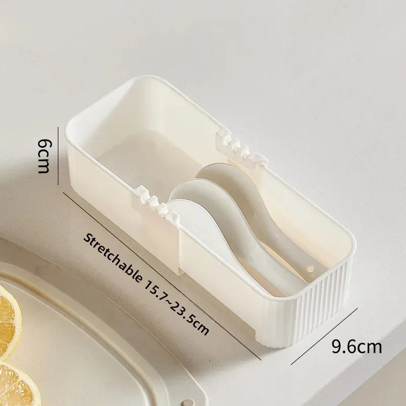 organiseur tiroir blanc adhésif couteaux cuillères fourchettes pinceau maquillage bouteilles cosmétiques sachets masques