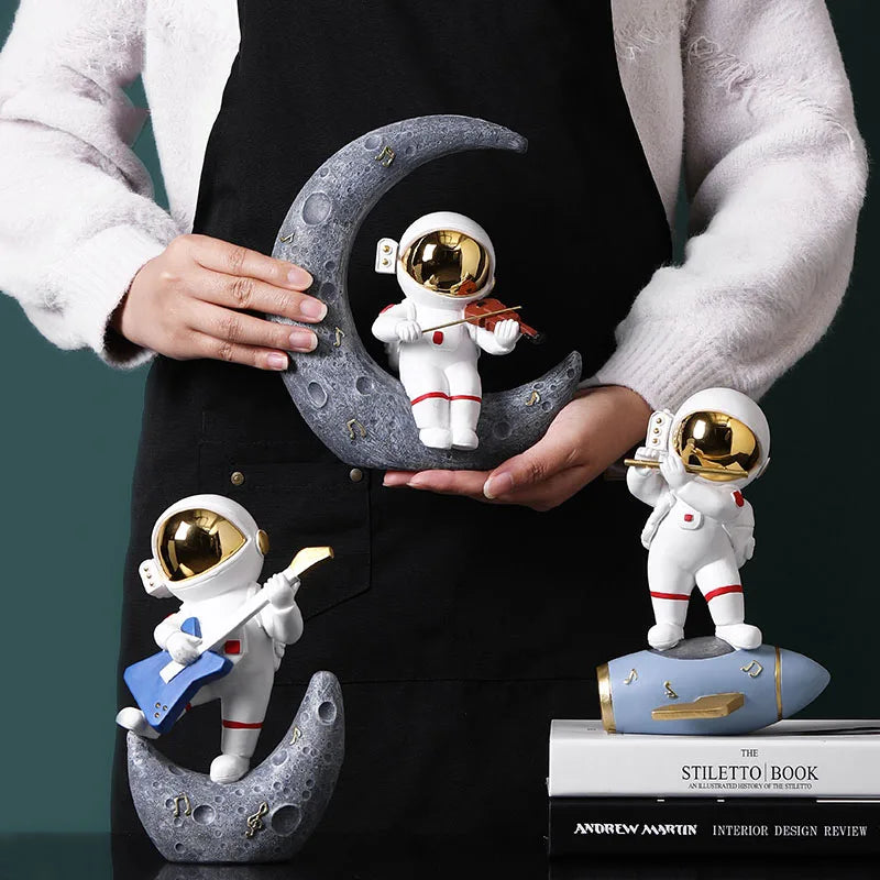 statue astronaute résine saxophone doré guitare violoncelle moderne décoration intérieure chambre salon