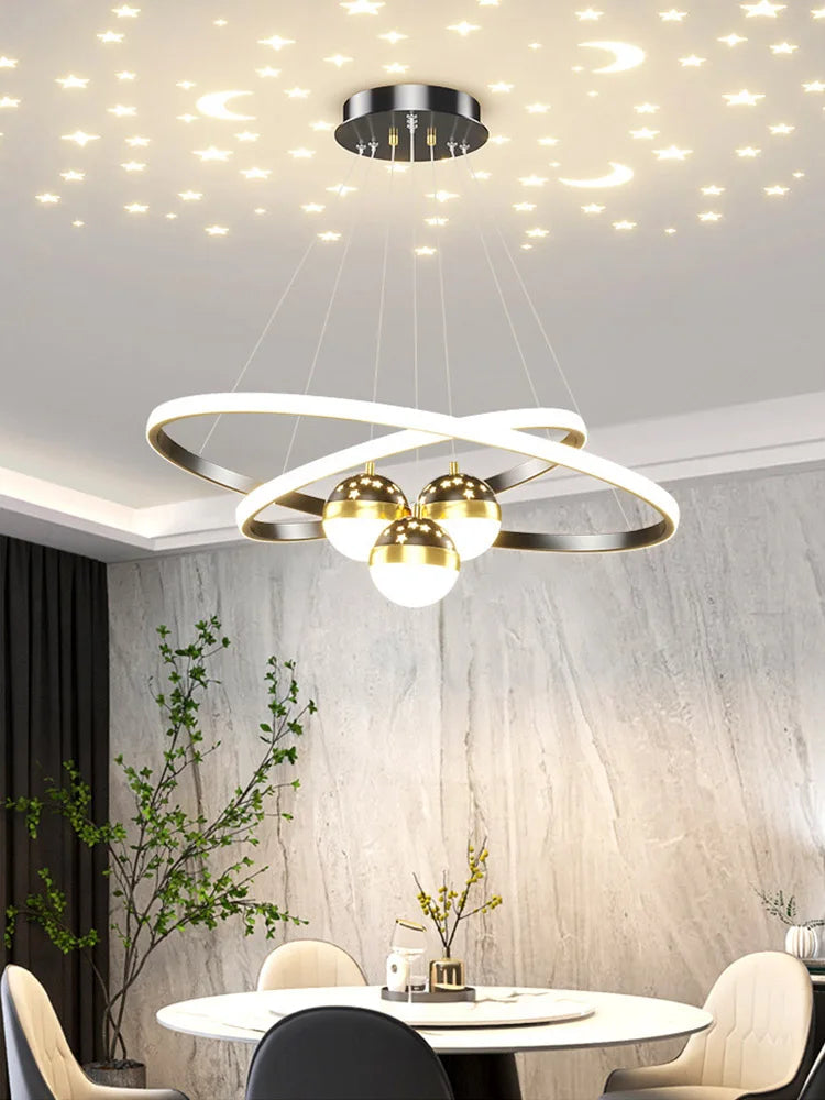 suspension lumineuse moderne noir or abat jours sphériques éclairage contemporain chambre salle manger