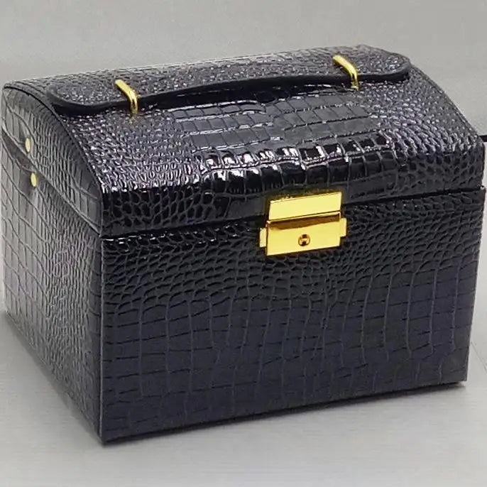 boîte bijoux rouge croco miroir compartiments poignée boutons dorés classique porte bijoux sécurité