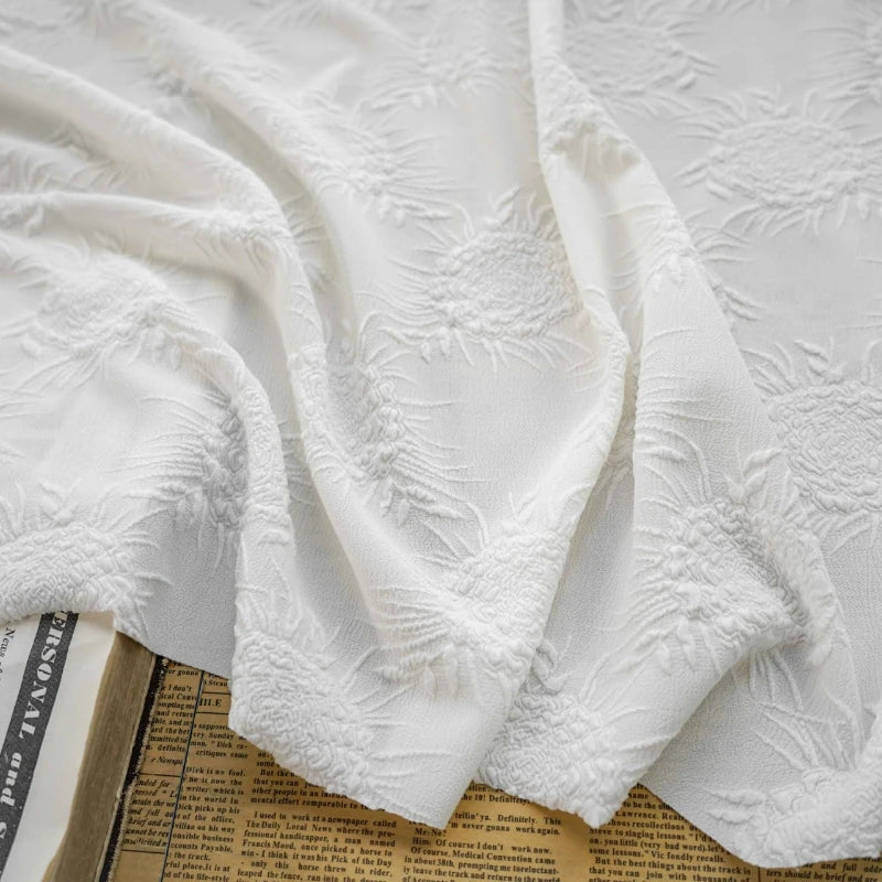 tissu polyester élastique fleurs blanches texture classique 150cm large 240g/m