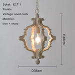 suspension lumineuse bois ornements sculptés finition rustique classique vintage blanc beige salle manger restaurant