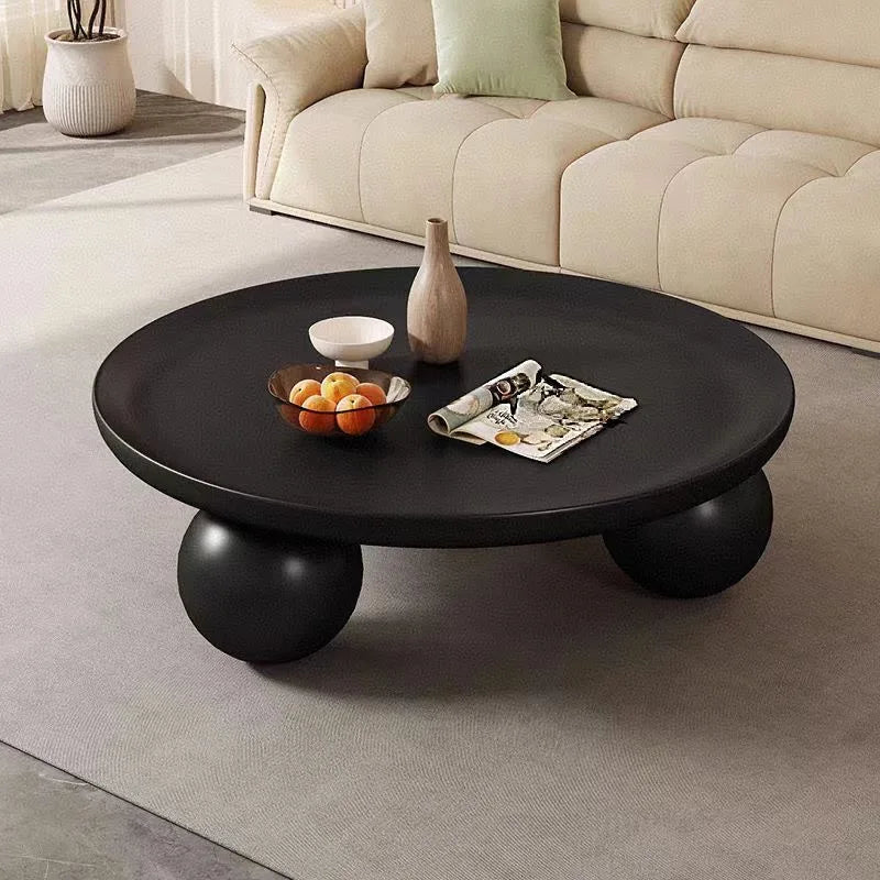 table basse ronde moderne pieds sphériques diamètre 75cm noir blanc cassé tulipes roses fleurs