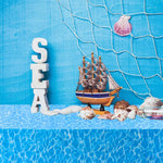 nappe jetable océan motif vagues bleu moderne coquillages bateau bouteille première année festive