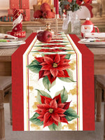 Un chemin de table festif orné de poinsettias rouges et de détails dorés, créant une ambiance chaleureuse et élégante pour les festivités de Noël.