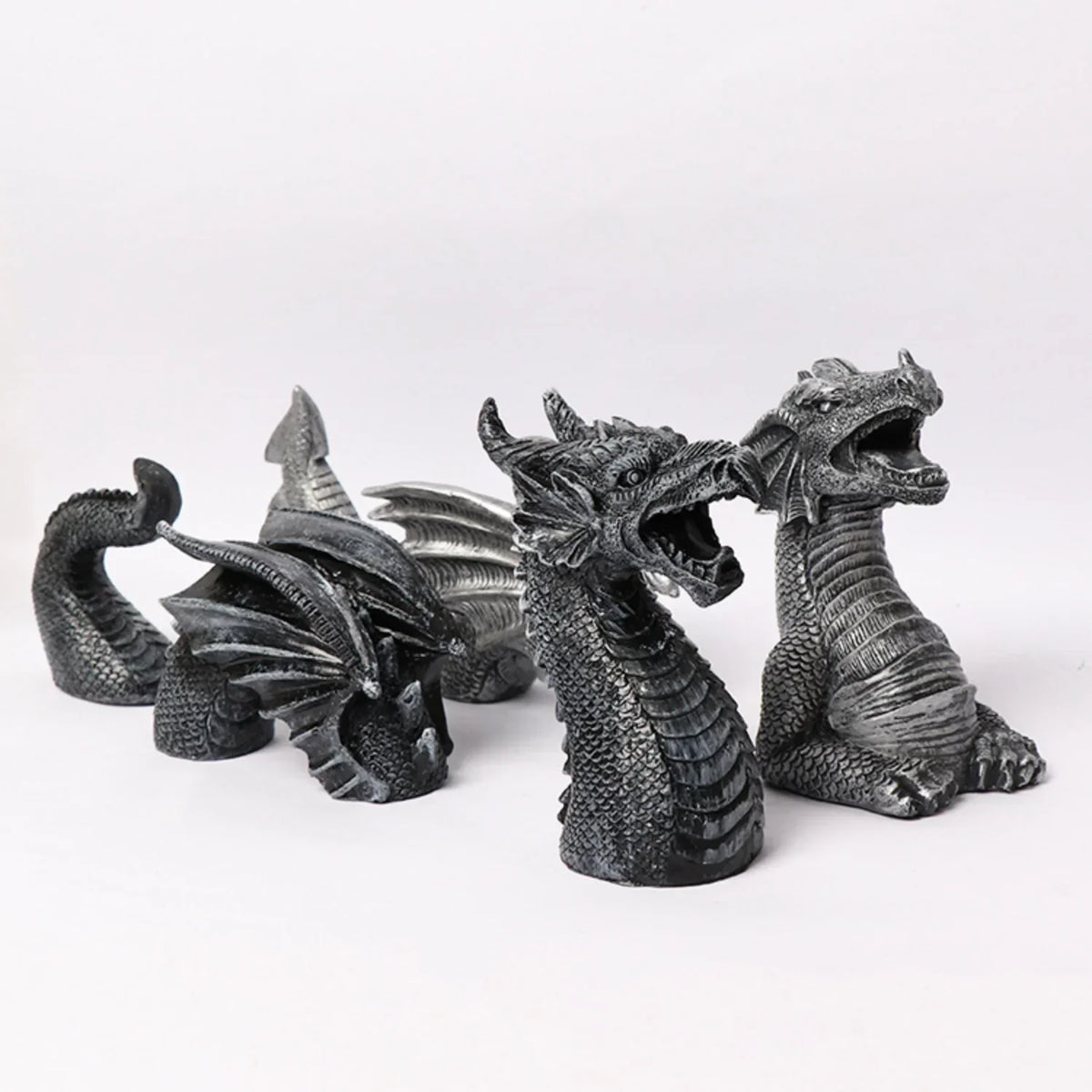 statues dragons decoratives exterieur intérieur gris argenté ecailles detaille fantastique medieval