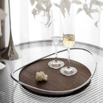 Plateau rangement moderne bois cadre métallique verres champagne bougies fleurs séchées desserts minimaliste élégant
