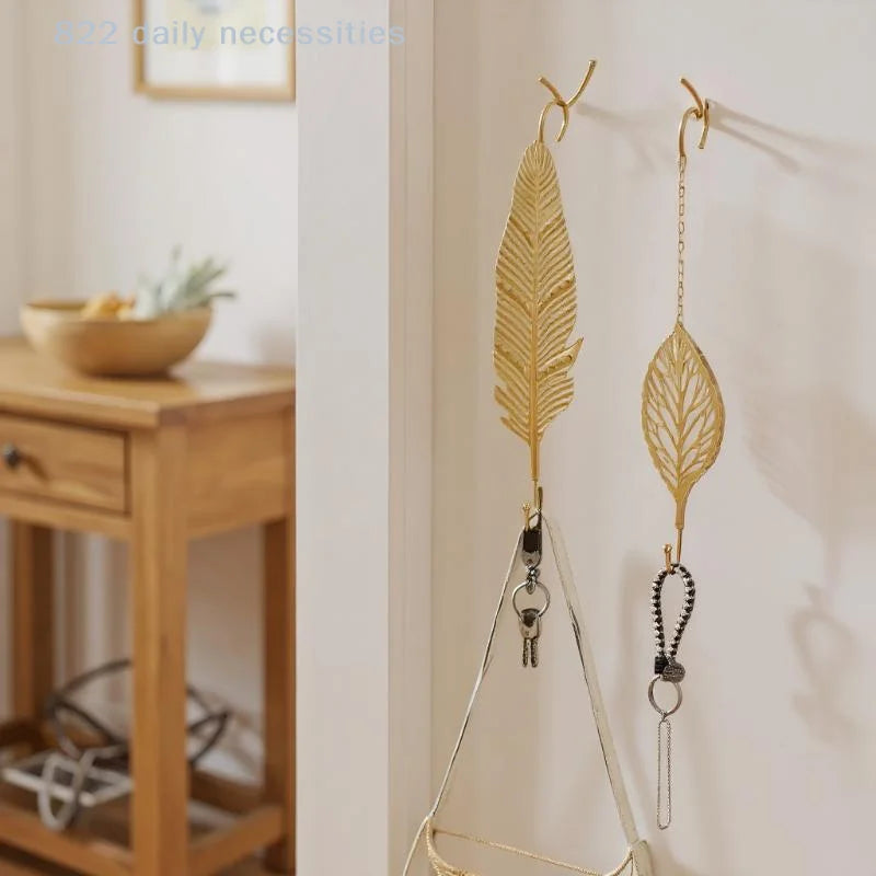 porte sacs porte serviettes chaîne boucle moderne décoratif acier inoxydable doré feuille stylisée