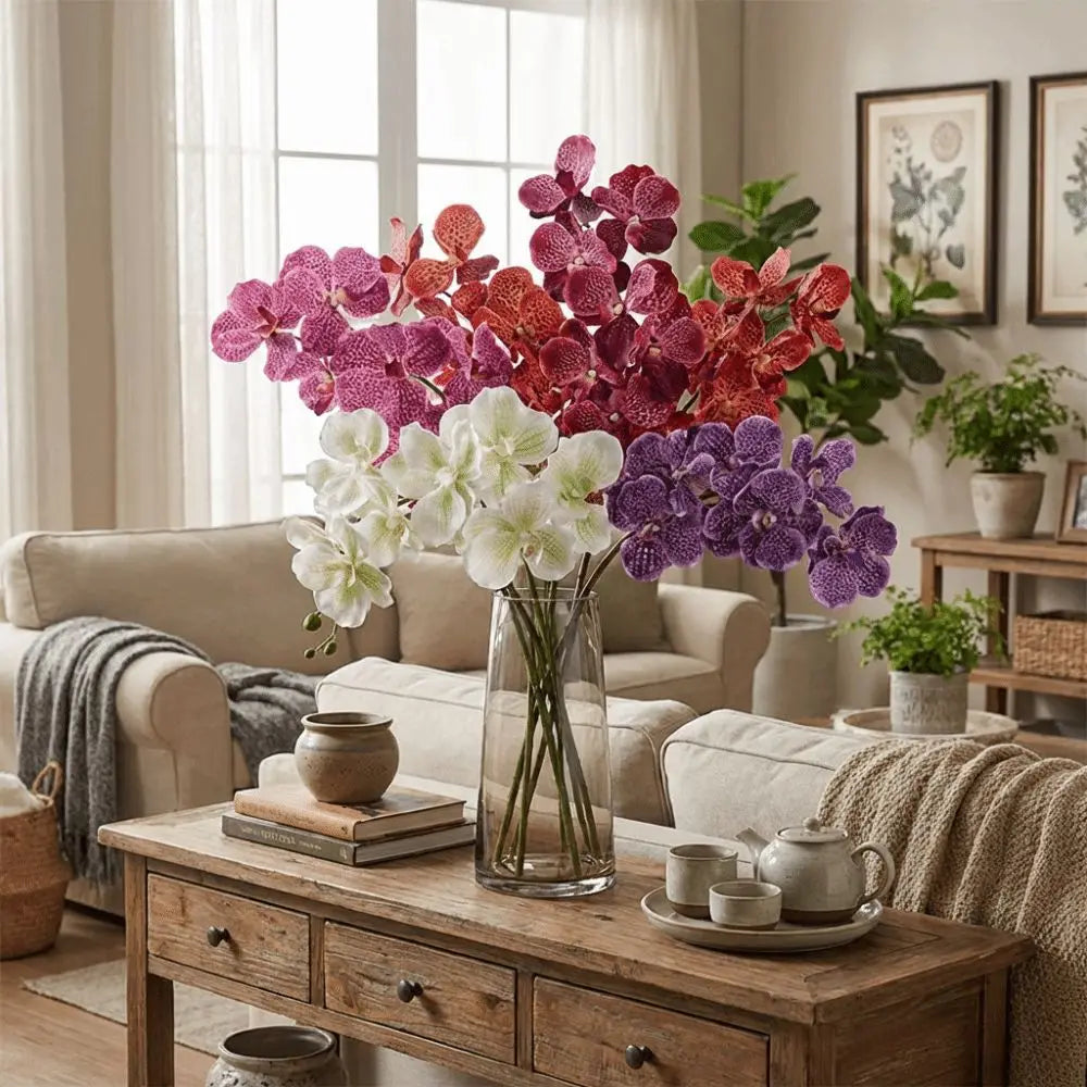 décoration intérieure moderne orchidées artificielles rose blanc rouge violet orange taches blanches vase verre