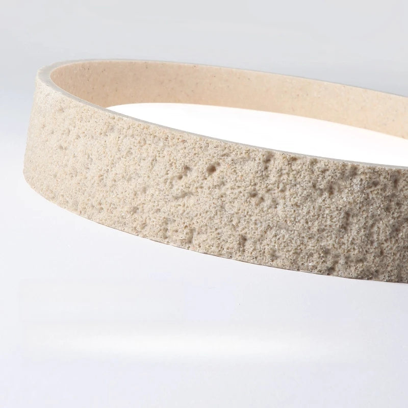 plafonnier led moderne pierre beige gris texture granulée éclairage zen minimaliste 4200k 3000k chambre