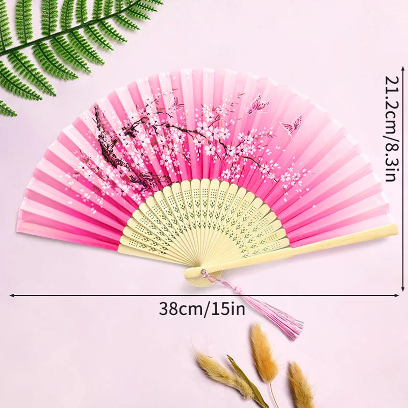 éventail pliant traditionnel bambou motif fleurs cerisier pompon mariage élégant