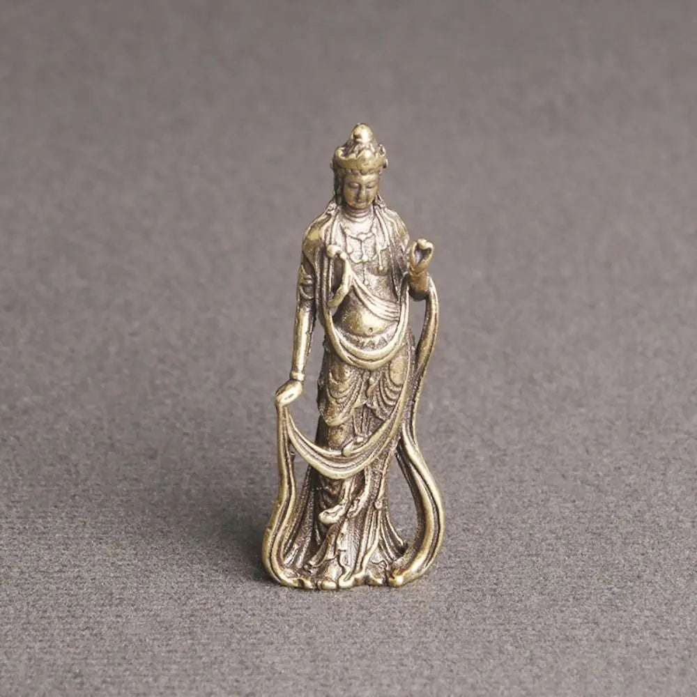 statue bouddhiste miniature dorée traditionnelle relief détails vêtements bronze religieux