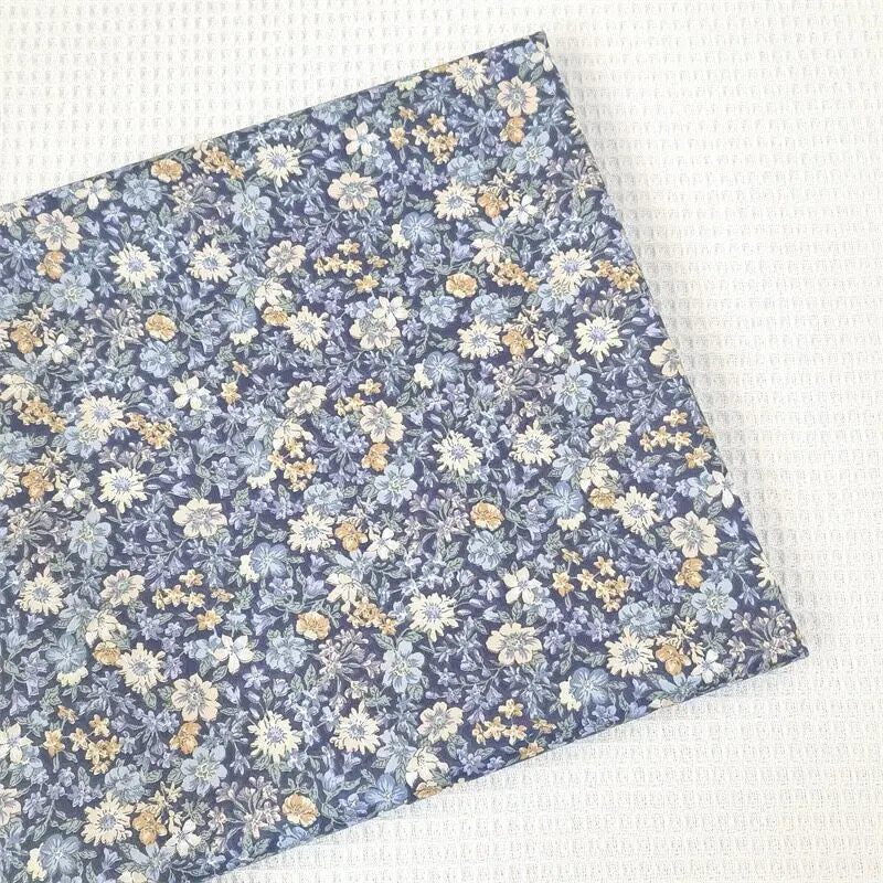 tissu imprimé coton fleurs bleu blanc orange vintage 160cm large classique