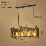 suspension lumineuse vintage oiseaux métal feuilles vert ampoules noir doré rustique