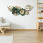 Décoration murale métal feuilles fleurs 3D accrochée au mur salon