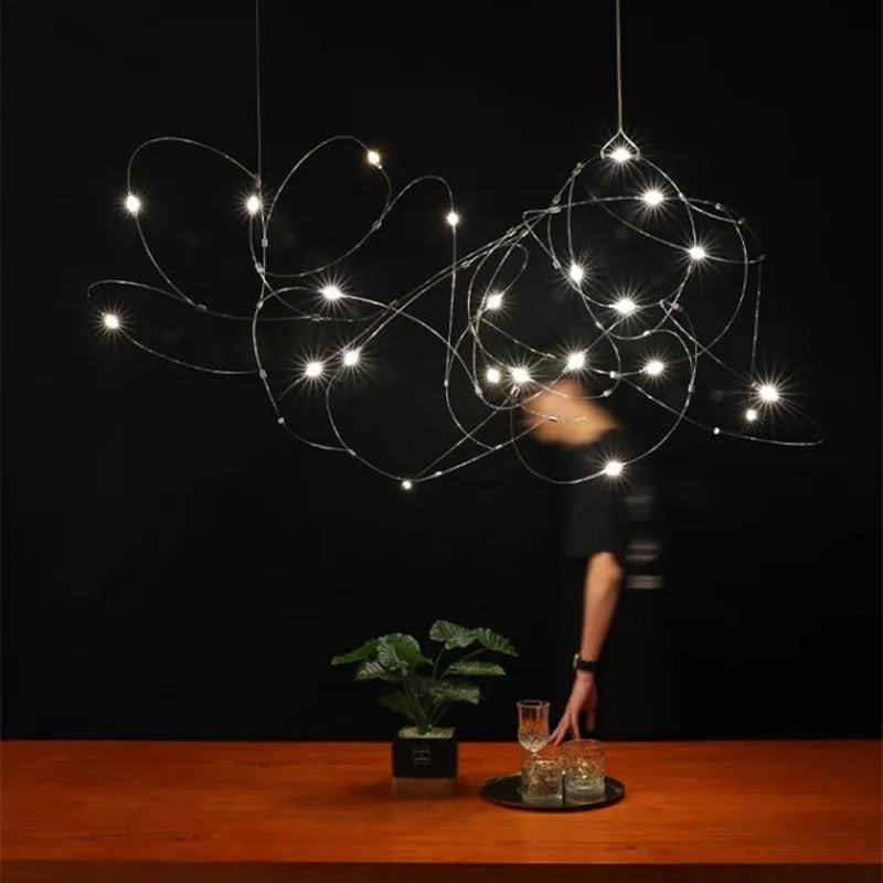 suspension lumineuse moderne spirales lumière blanc doré chambre salon