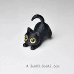 figurines chats miniature résine noir blanc yeux jaunes brillants cartoon mignon décoration erotiquecollector