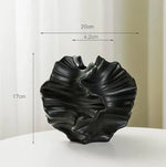 vase céramique porcelaine moderne beige clair relief sculptural plumes séchées fleur artificielle opaque organique