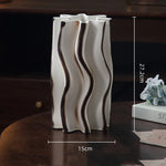 vase moderne rayures diagonales blanc orange rouge décoration maison arrangement floral