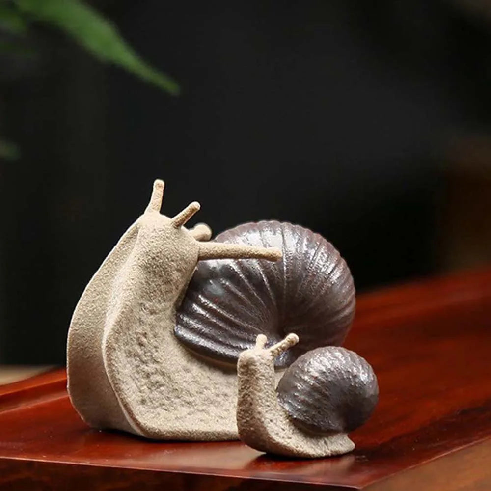ornements céramique escargots gris artisanal détails sculptés décoration thé animal compagnie miniature imitation antique
