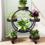 meuble plante rotatif moderne niveaux métal ajouré noir roulettes freinées balconintérieur
