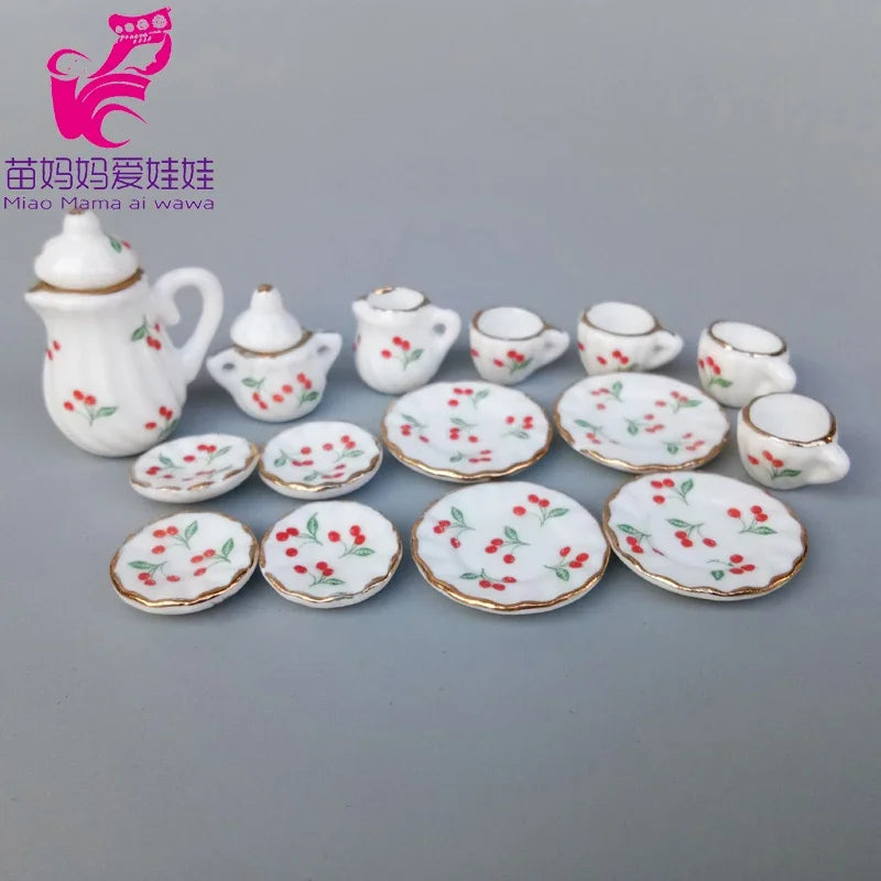service thé miniature blanc doré rose bleu vert fleurs classique tasse théière soucoupe assiette