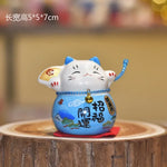 chat souriant tirelire céramique japonaise motifs floraux couleur rouge vert rose bleu jaune