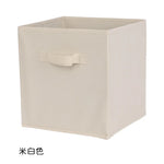 boîtes rangement pliables tissu uni moderne bleu marine beige jaune vert poignées détachables respectueux