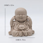 statuettes bouddha enfant résine beige clair marron motifs dorés zen
