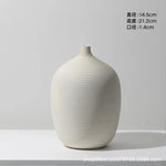 vases céramique blancs rayures horizontales modernes fleurs artificielles