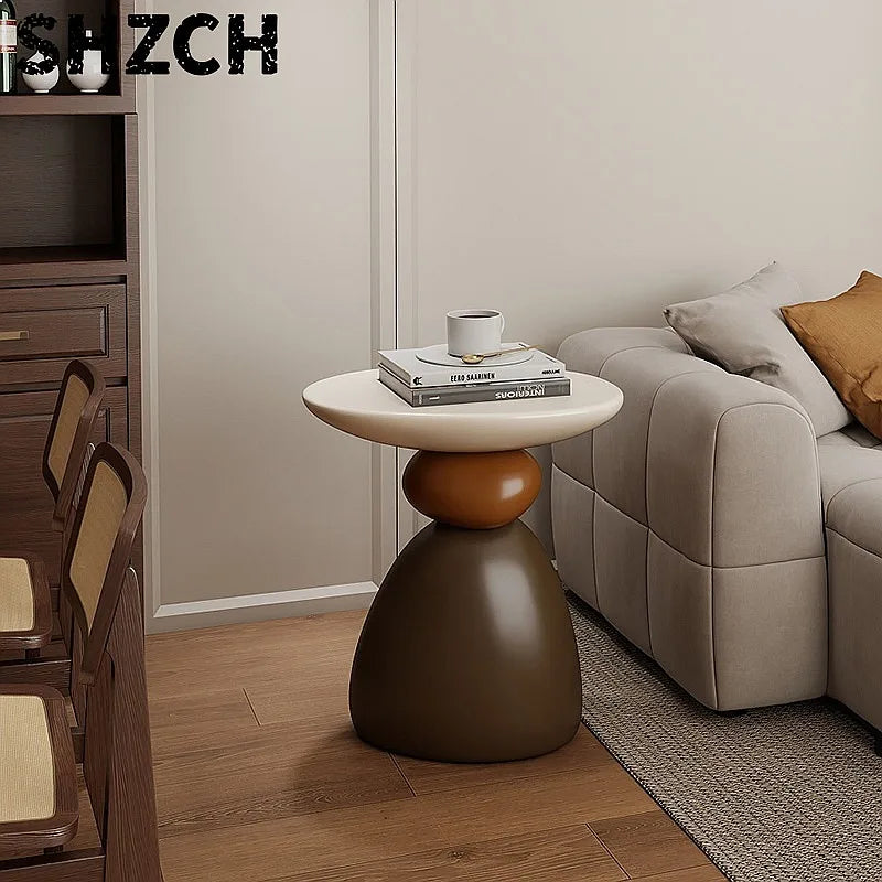 table basse ronde pierre moderne minimaliste sculptural couleur vive salon